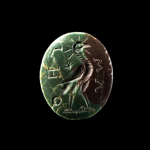 *A Roman gnostic green and brown jasper intaglio. Phoenix.